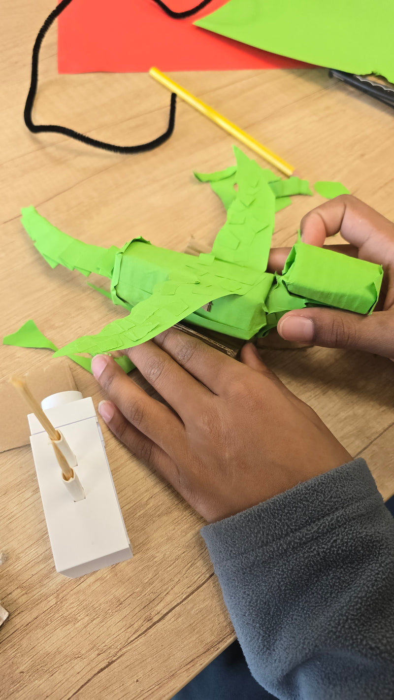 Learners building at a HYEN workshop